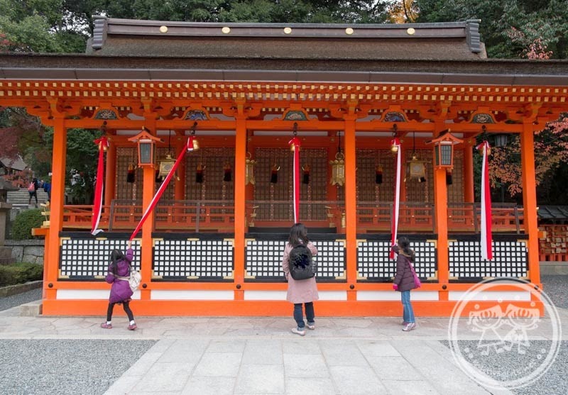 Making a wish at Fushimi Inari Shrine