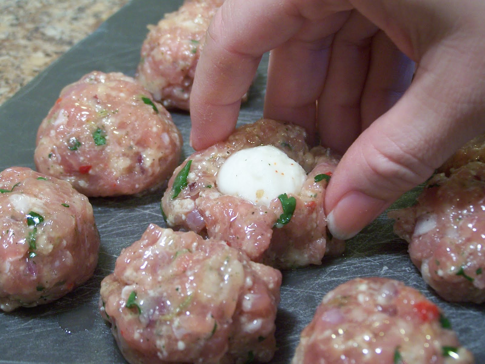 The Peppered Pantry Sausage Stuffed Meatballs