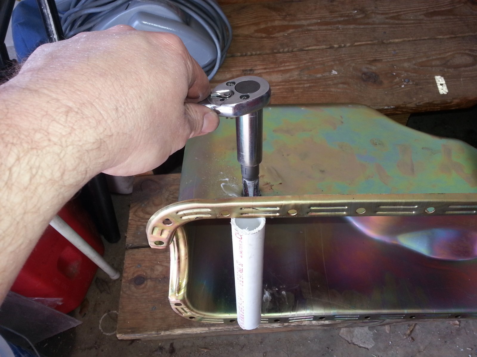 How to punch a hole in your oil pan for a Vortech Supercharger