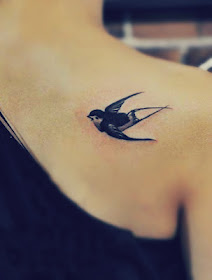 back sparrow tattoo on the shoulder