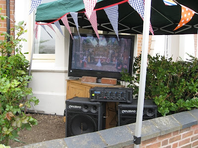 The Royal Wedding on TV in a front garden
