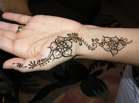 A Simple Floral Henna Design Start from thumb to wrist.