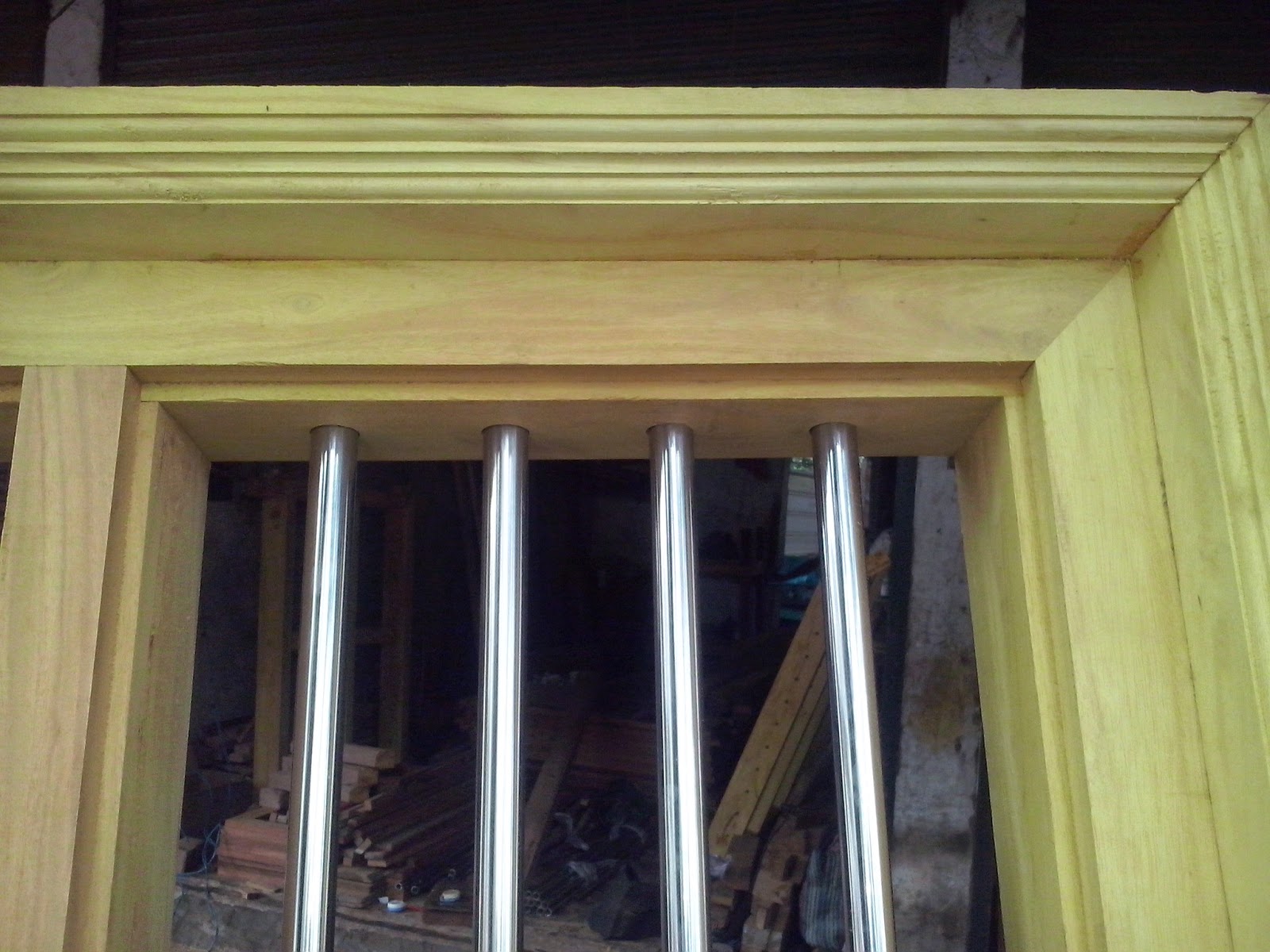 Wooden window frame with steel Pipe -kerala style wooden window frames ...