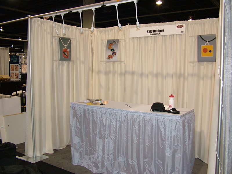 handmade resin jewelry by Katherine Swift Resin jewelry booth at ACRE