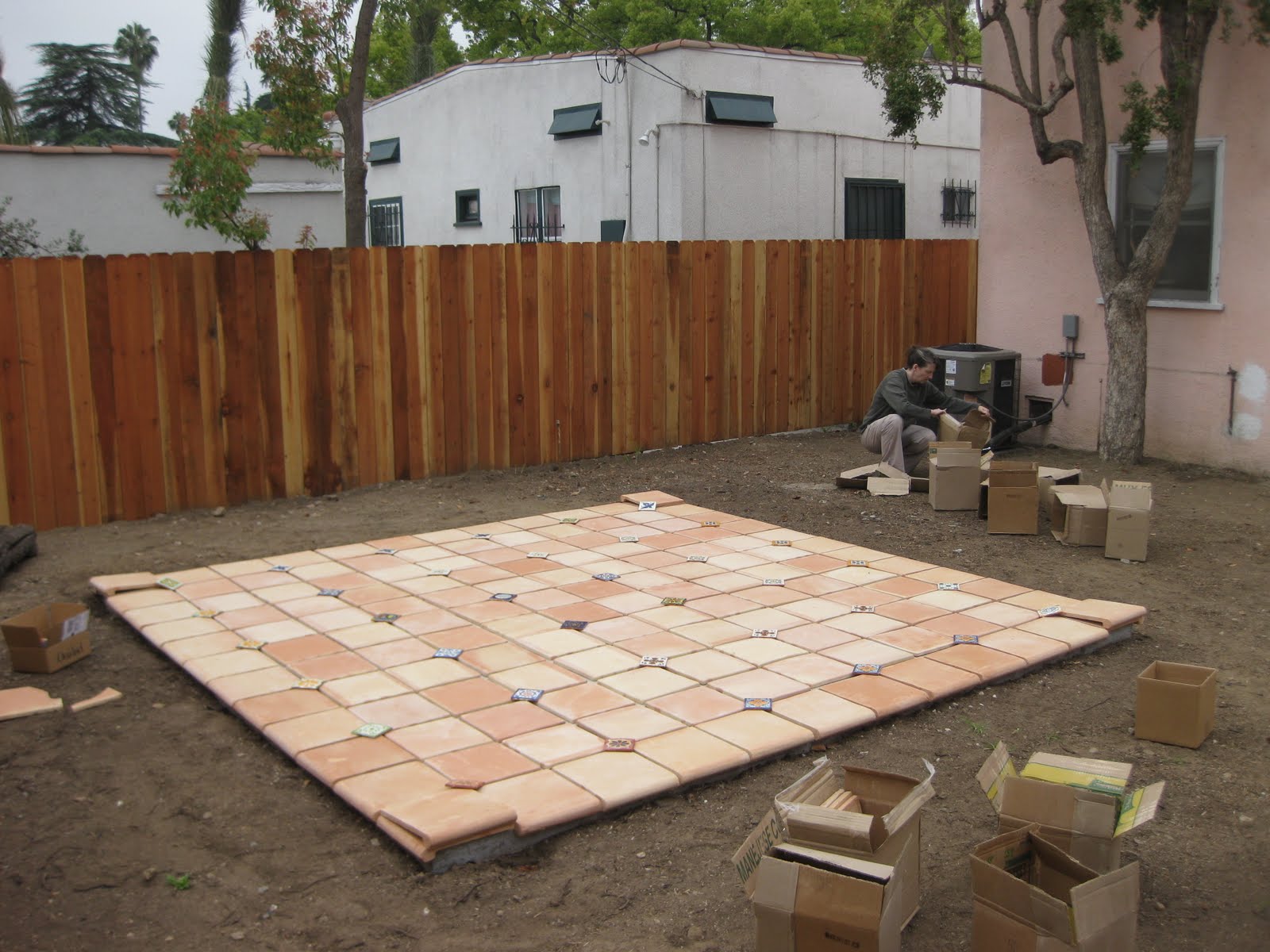 Pink Spanish Laying Out Patio Tile