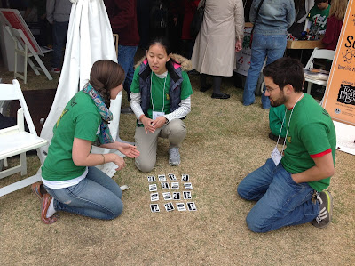 Teaching the card trick to Computer Science student volunteers at the Tucson Festival of Books.