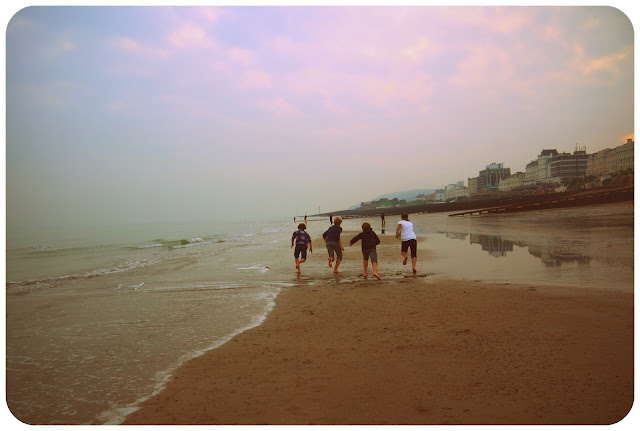eastbourne beach seafront seaside children running eastbourne beach seafront seaside children running