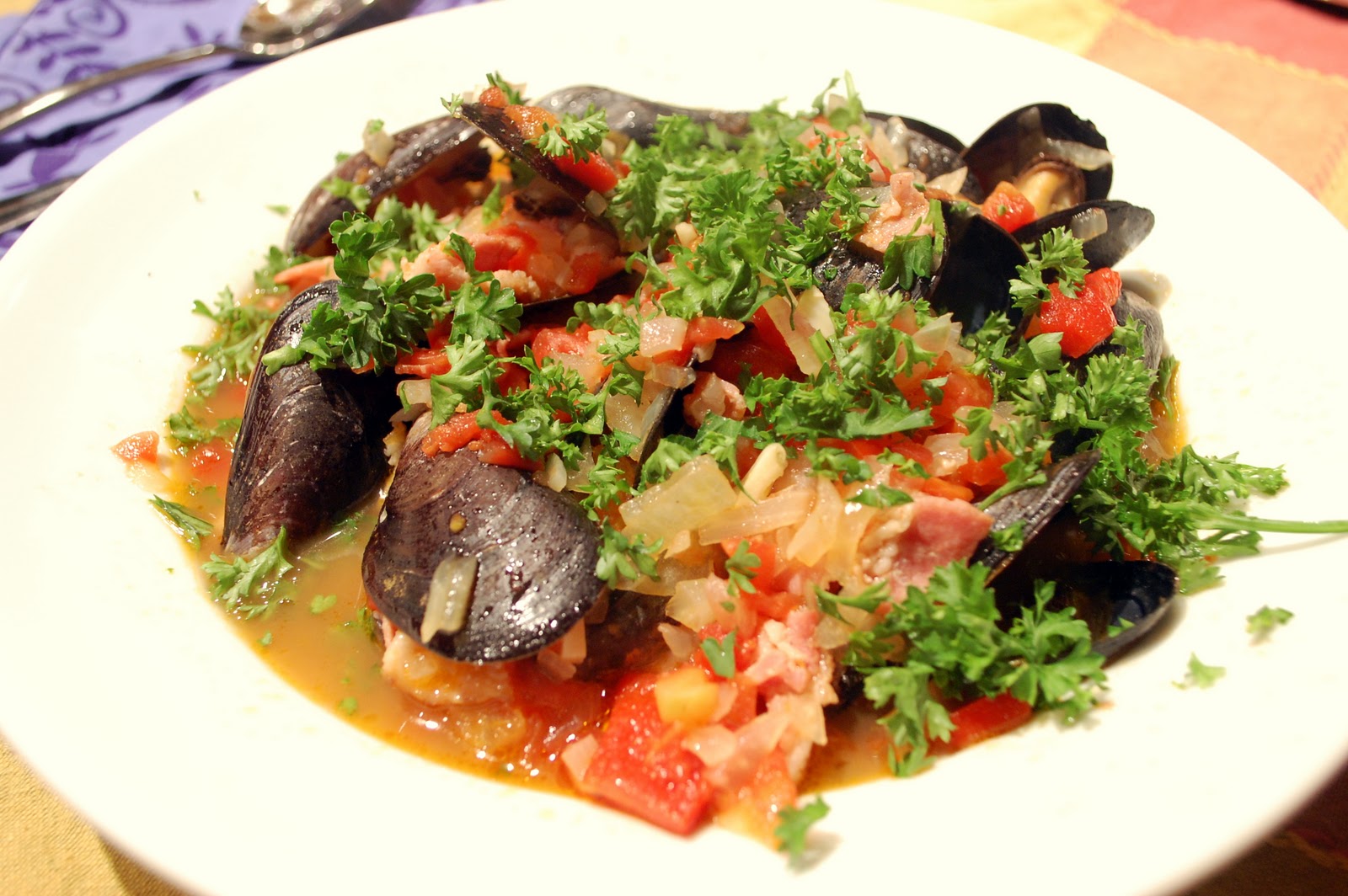 The Skillet Takes Mussels with Bacon and Tomatoes