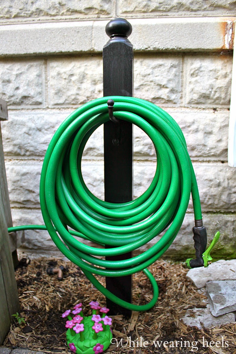 While Wearing Heels DIY Garden Hose Holder