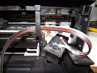 canon cartridges and hoses out of the right side canon cartridges and hoses out of the right side
