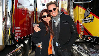 Roma Downey and her husband Mark Burnett at a NASCAR race in Virginia. Roma Downey and her husband Mark Burnett at a NASCAR race in Virginia.