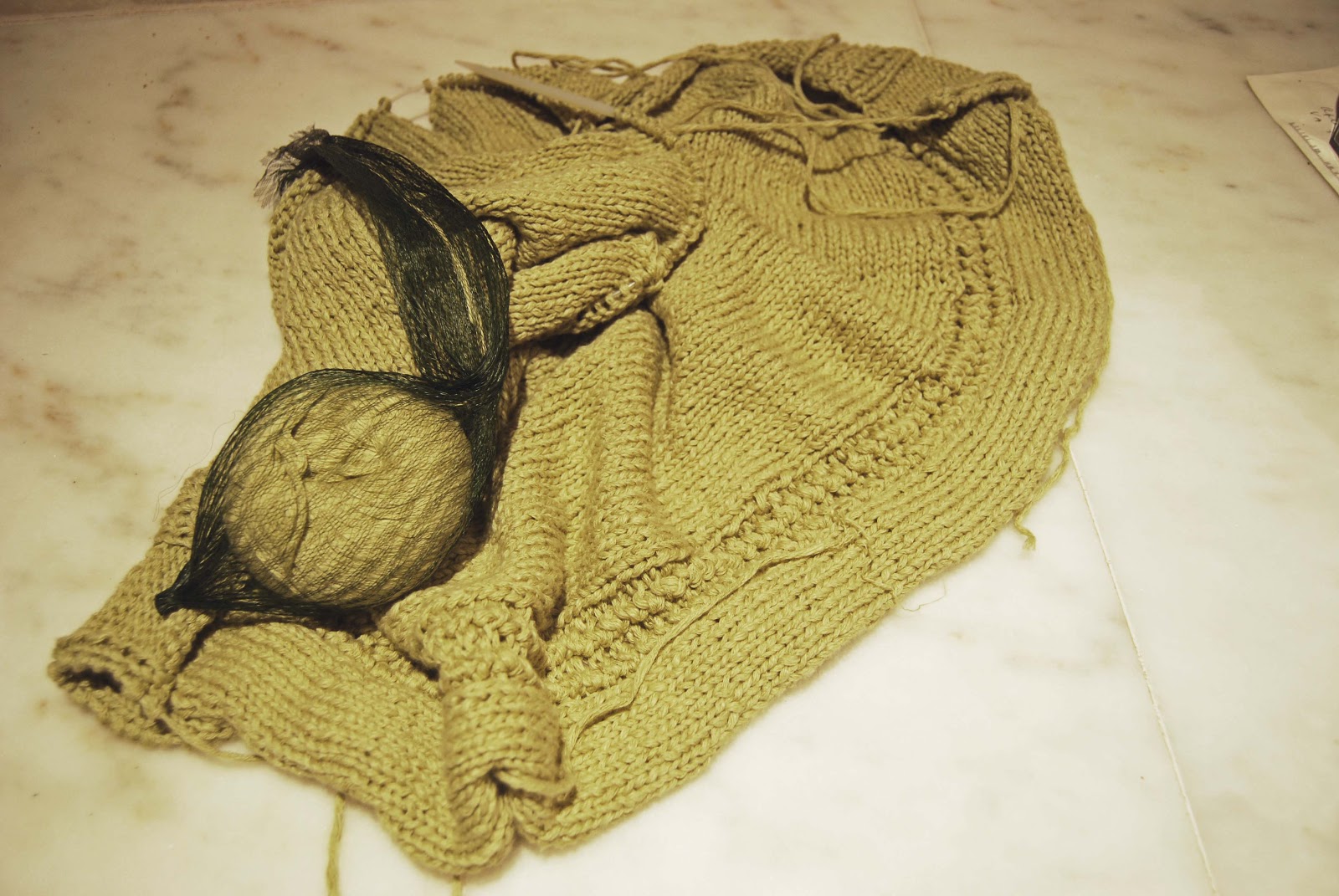 With needle and stick Button Sweater