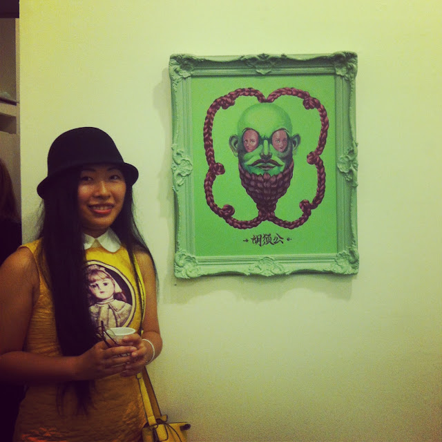 Yeok in front of her work at "Men with beards" group show