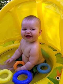 Freddie in the paddling pool