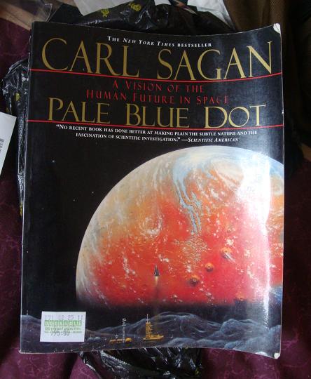 Give a man a fish and he'll eat for a day. Give a man a Book Sale and he'll forget all about eating. my own copy of Pale Blue Dot, fresh from Book Sale