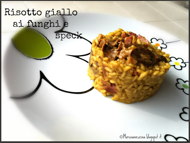 risotto giallo ai funghi e speck e... mi faccio una breve vacanza!