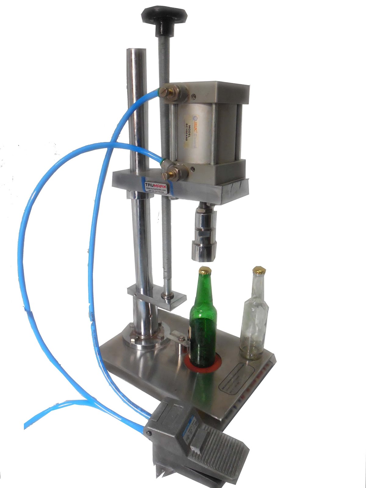 FILLING CAPPING LABELING MACHINES Semi automatic snap on capping machine