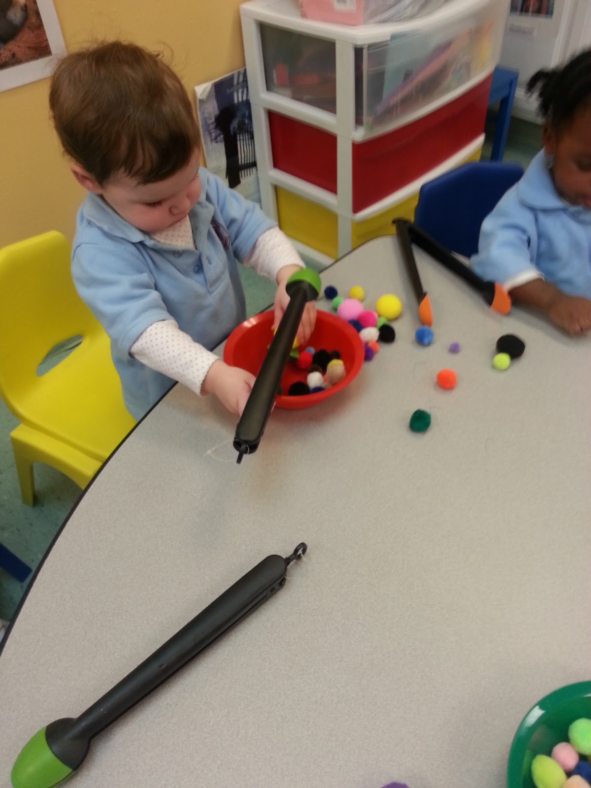 to the HH Toddler Classroom! Threading Beads, Stacking Cheerios on spaghetti noodles