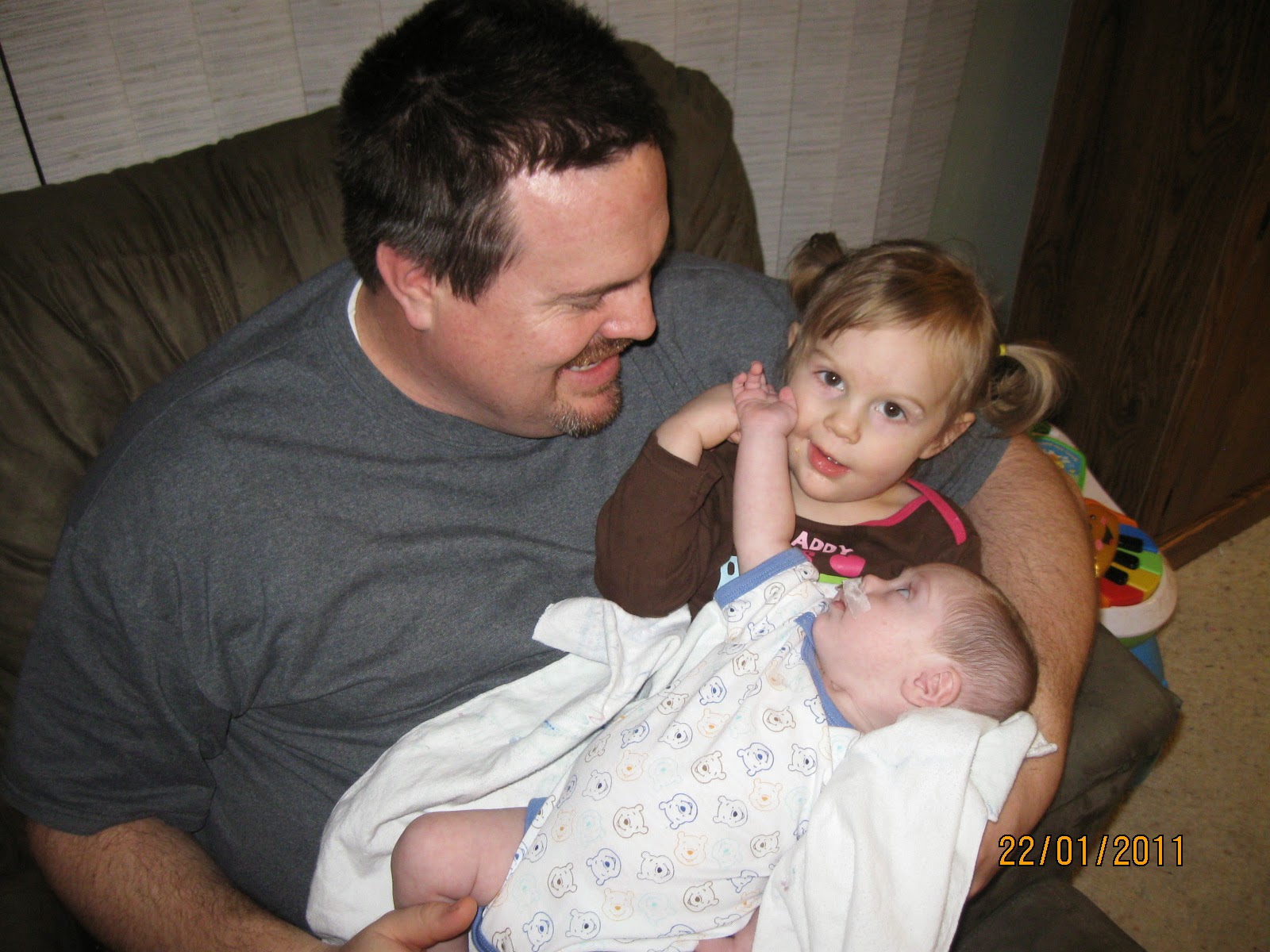 Jacob hanging out with his dad and sister