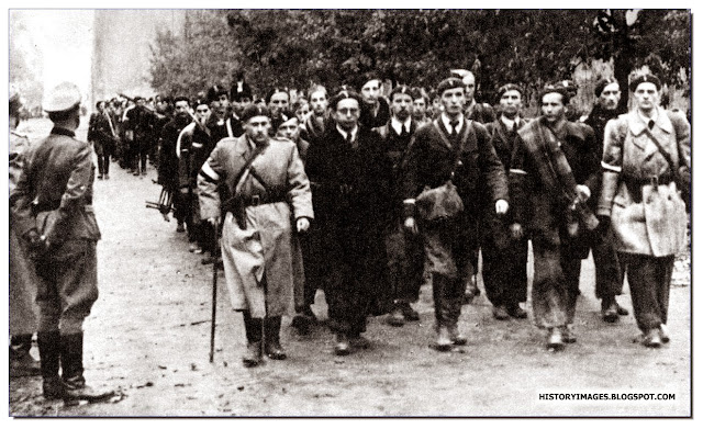 Armia Krajowa fighters march into captivity Warsaw Uprising 1944