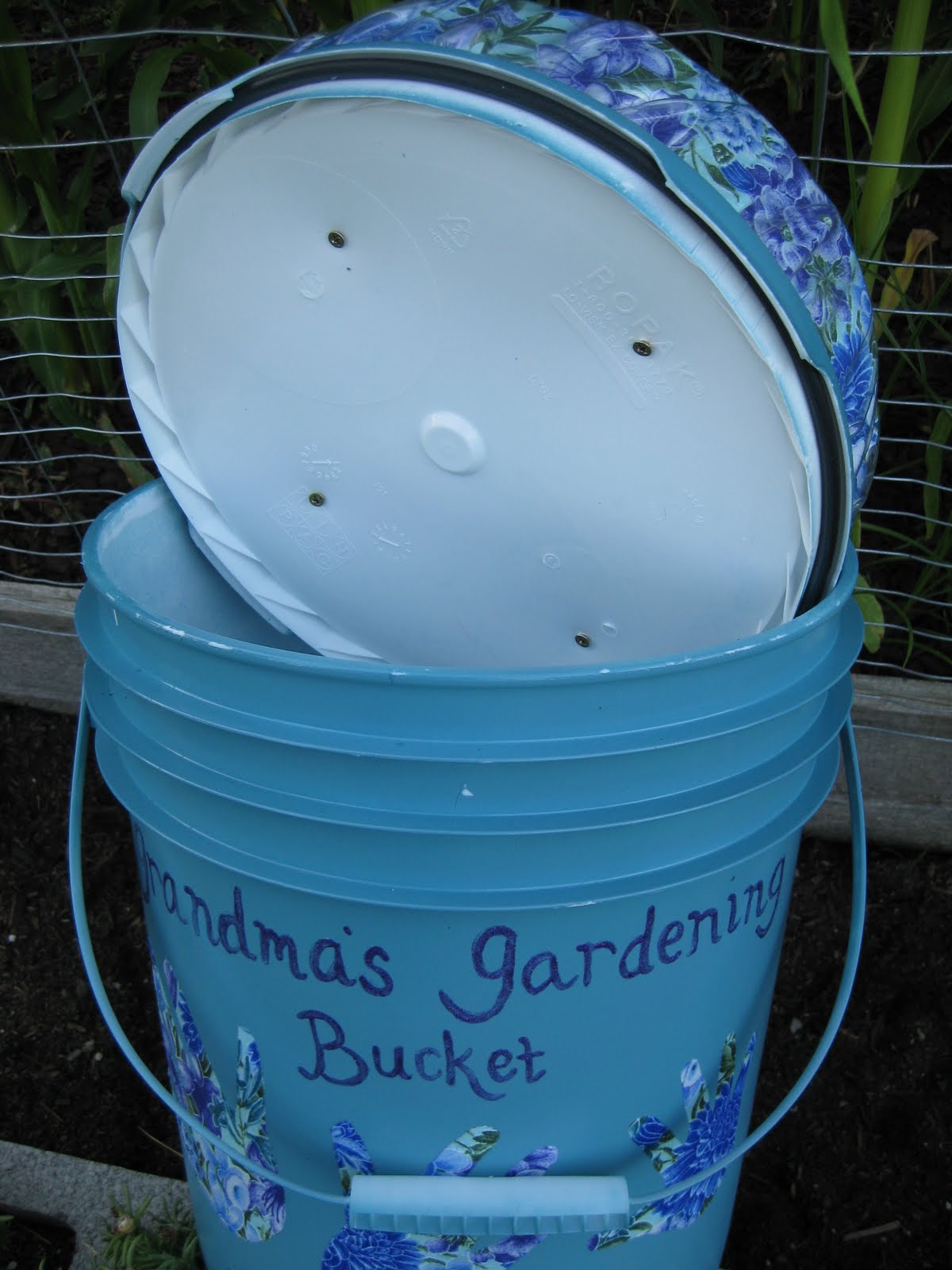 A Hen and Her Chicks Gardening Bucket