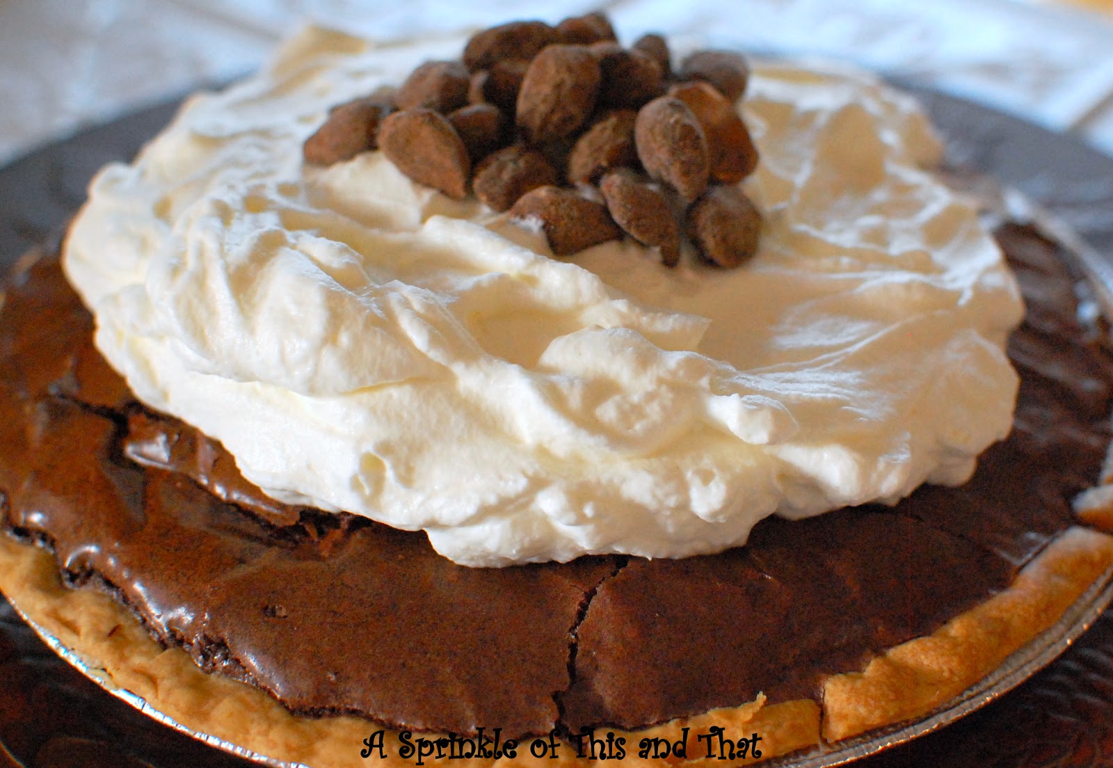 A Sprinkle of This and That Symphony Brownie Pie with Almond Whipped