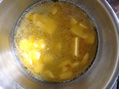 Melting butter and syrup in saucepan