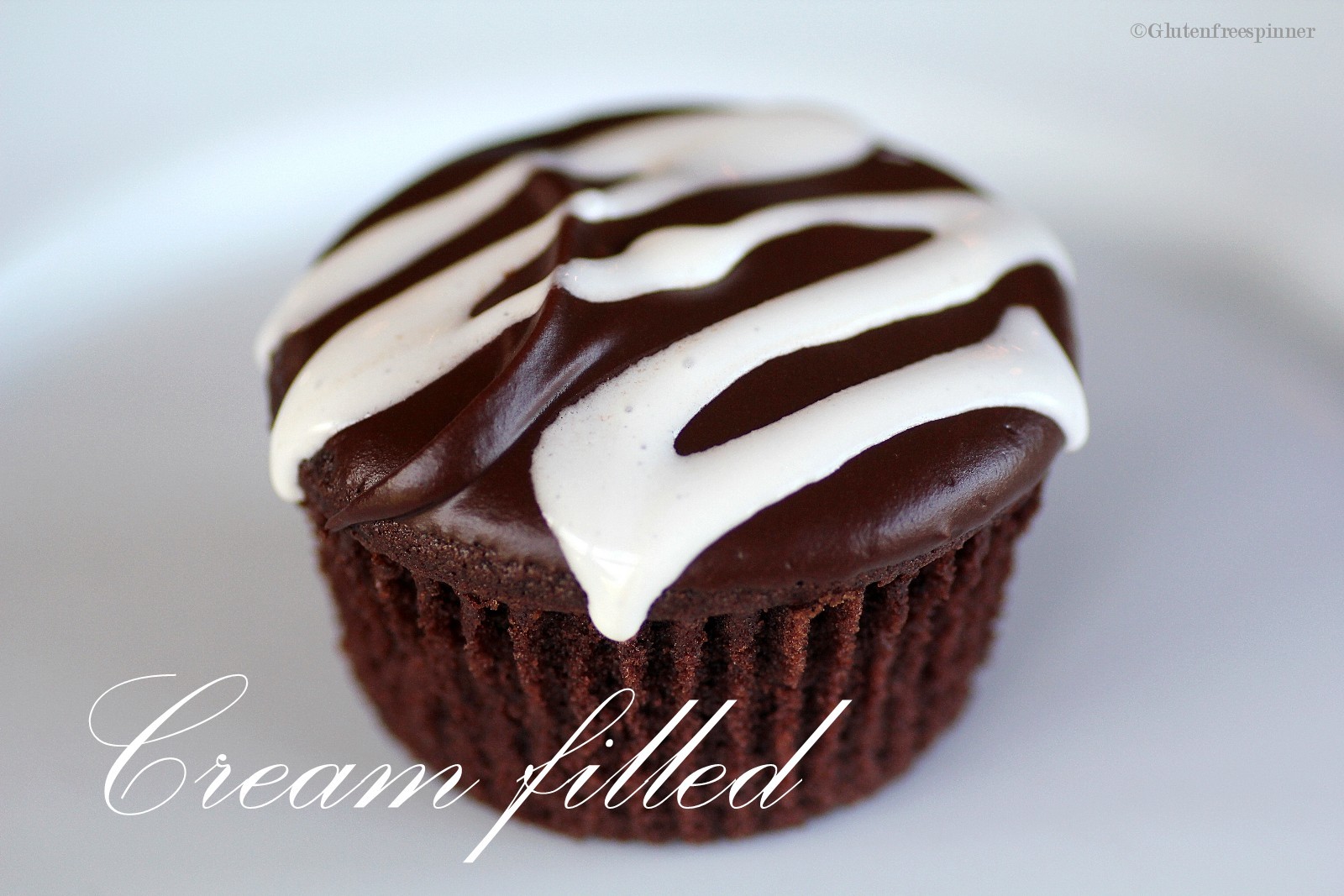 Cream Filled Devil’s Food Chocolate Cupcakes