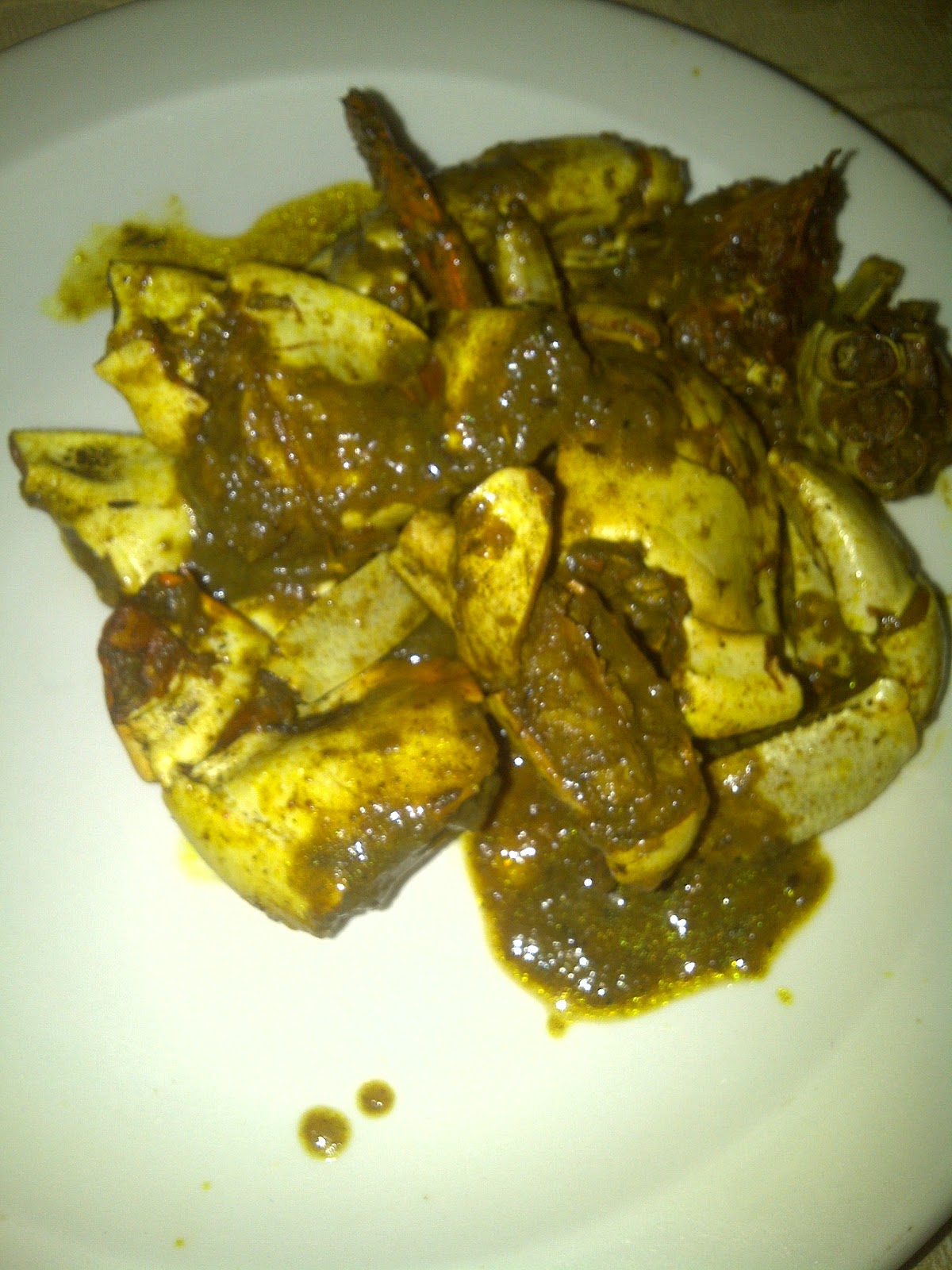 RUBY'S CAKES AND JAMAICAN CUISINE Curried Crab and Roti