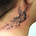 Tattoo Feminina borboletas no pescoço