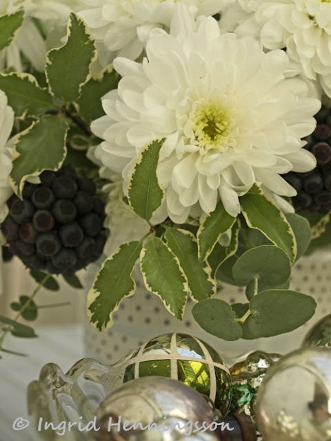 The white Chrysanthemums are from the Farmers Market the grey Eucalyptus 