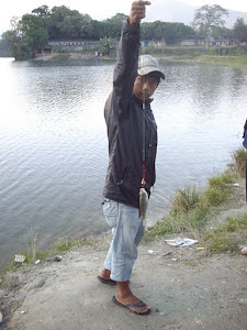 Yogesh, the fisherboy with a candid catch on his hook.(Wednesday  23-11-2011).