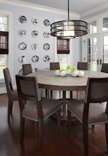 Black Round Dining Tables for Various Dining Room Designs Comfortable Wooden Chairs around the Round Dining Tables under Unique Drum Pendant Light and Grey Ceiling