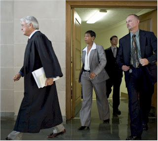 U.S. Marshals protect federal judges in the courtroom.