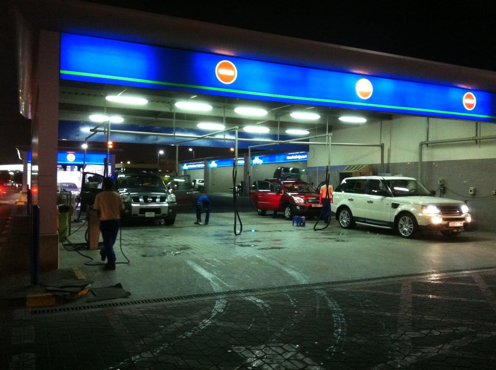 Qatar Culture Club WOQOD Petrol Station in Doha Examining Social