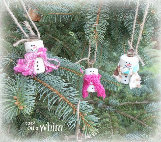 Electric Fence Insulators Repurposed into Snowmen Ornaments from Denise on a Whim