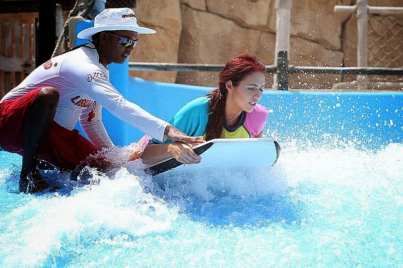Amy Childs Strips Down To A Colorful Bikini In Dubai The reality star seemed to attached to her famous two-piece that she dug it out as she enjoyed a fun filled day out at a Dubai water park on Sunday, May 18, 2014.