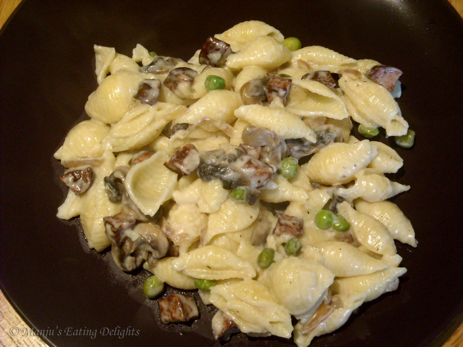 Manju's Eating Delights Pasta Shells in white sauce with Sausage