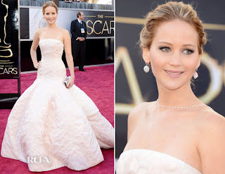 Jennifer Lawrence in a light pink, fairytale gown at the Oscars 2013.