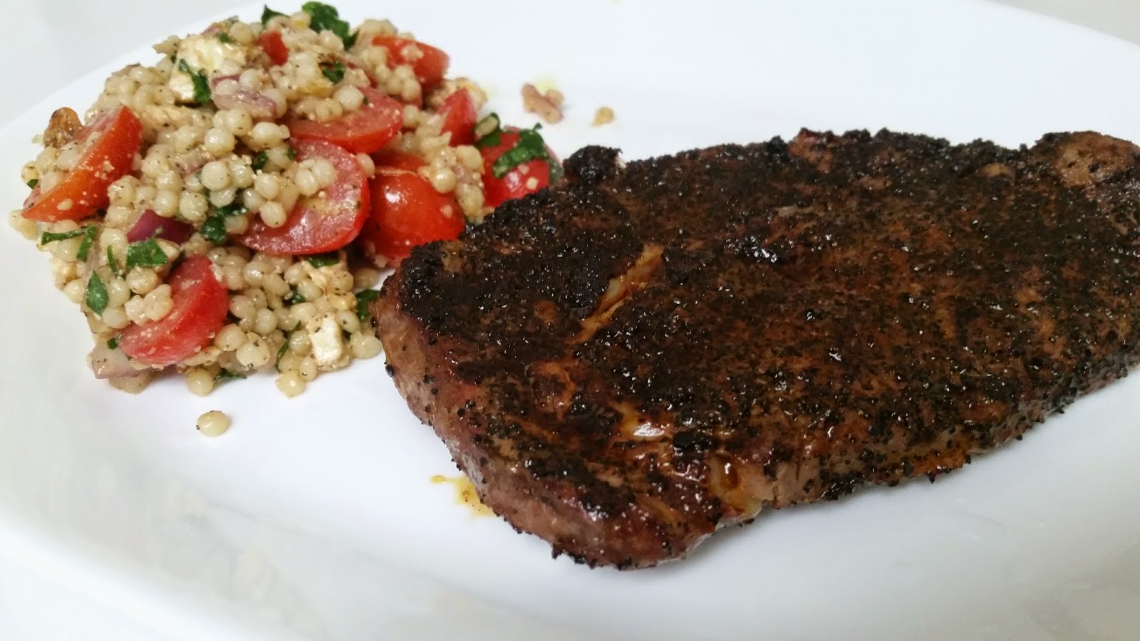 Coffeerubbed Sirloin Steak with Cous Cous Tomato Salad