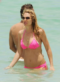 ILARY BLASI and Francesco Totti in the background in water