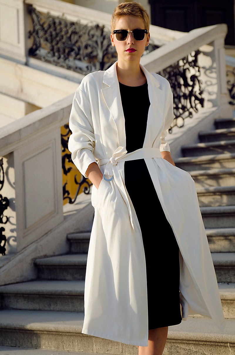 white sleeveless duster jacket