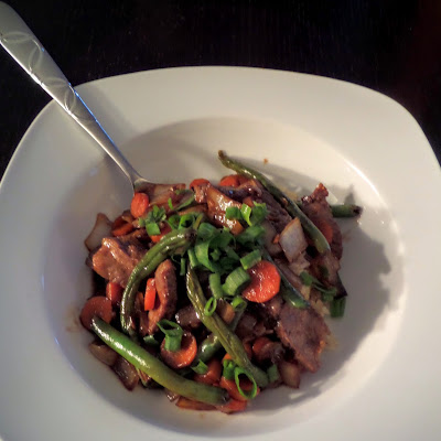 Szechuan Beef  Stir Fry:  A spicy beef stir fry, with bold flavors of ginger and garlic with just a hint of sweetness, made with leftover steak.