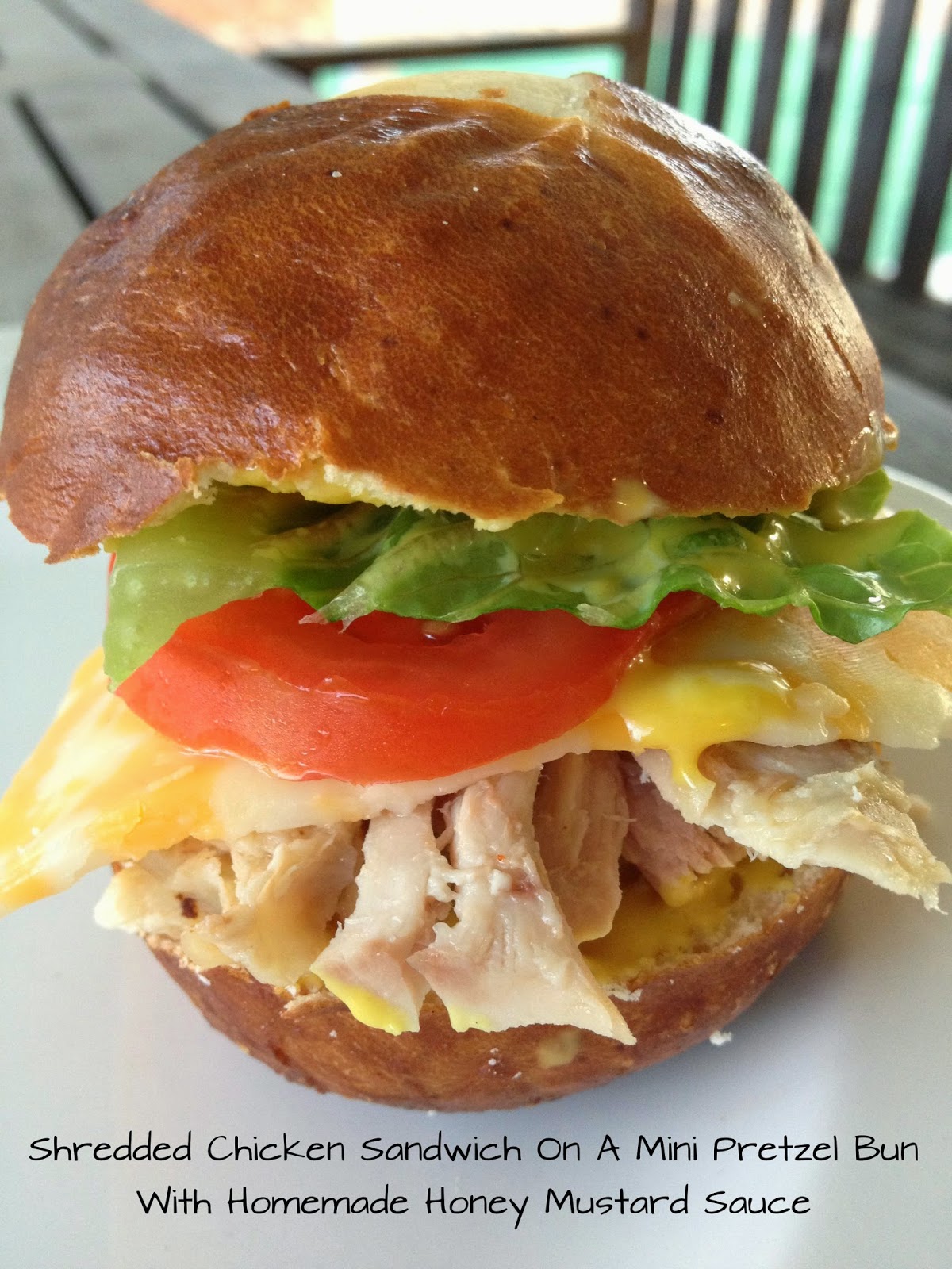 Be Brave, Keep Going Shredded Chicken Sandwich On A Pretzel Bun With