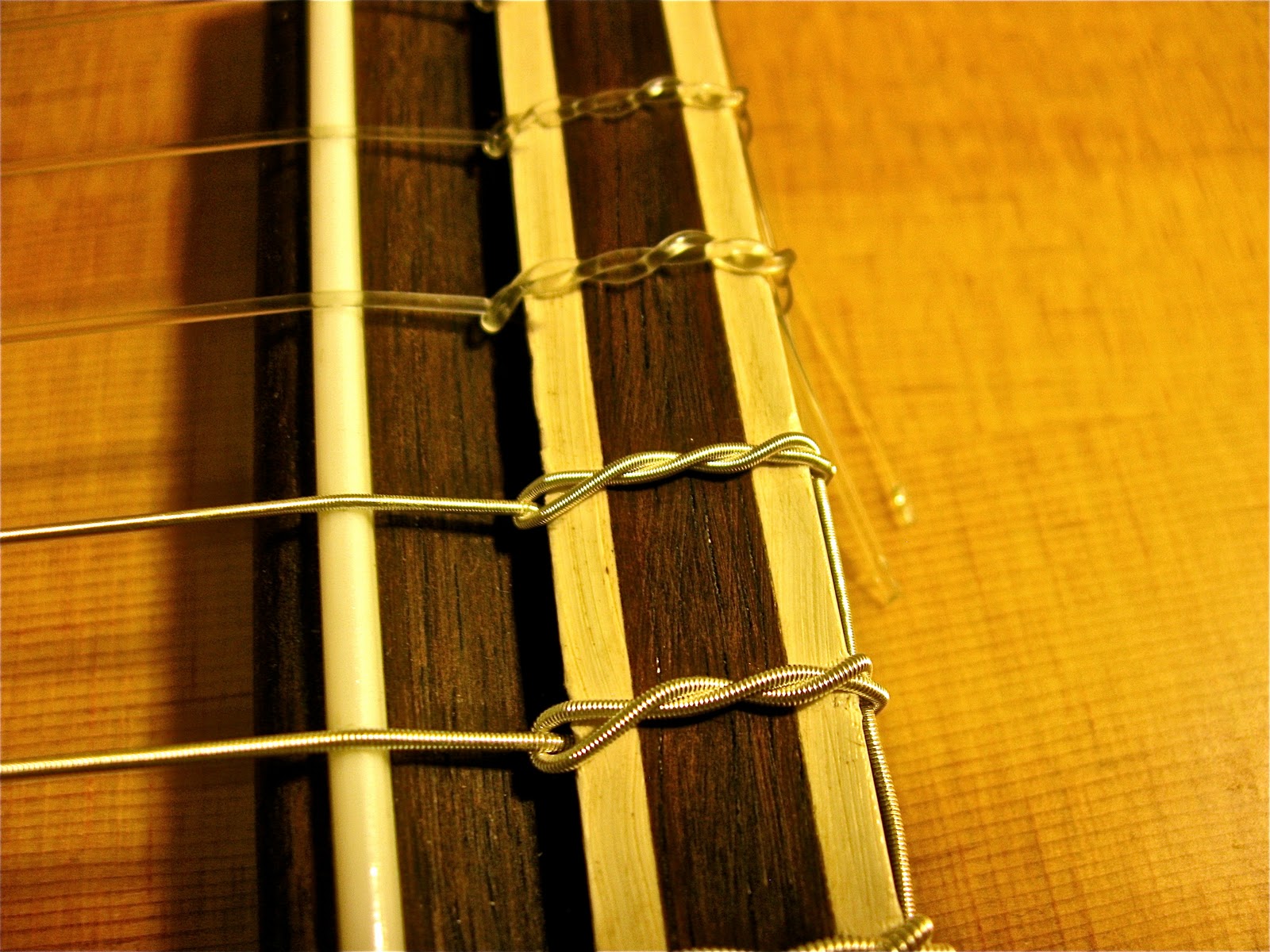 Native Guitar Joe How many loops do you use to tie classical strings