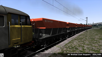 Fastline Simulation - HBA/HEA Coal Hoppers: In Train Simulator 2013 shot of HBA and HEA hoppers in Railfreight Flame and Grey livery testing numbering and lettering arrangements. Still some texture work to complete before the master versions are finished along with making the maroon versions