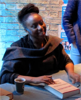 Chimamanda Ngozie Adichie signing books