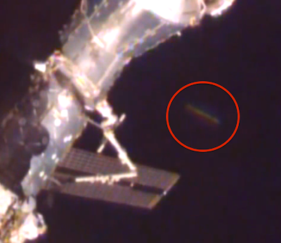 UFO Sightings Space Station Long Cigar UFO Caught At Space Station, UFO Sightings