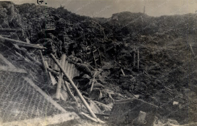 A view of the Hooge crater showing sandbags and other debris from German dugouts, August 1915 (D/DLI 2/2/213)