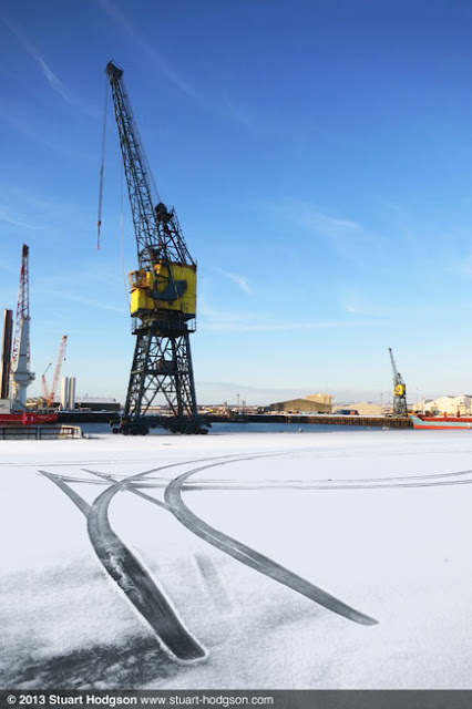 Hartlepool Docks with tyre tracks in a snow covered yard